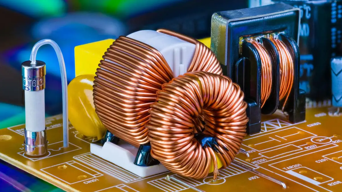 What is the role of an inductor in a buck or boost converter?
